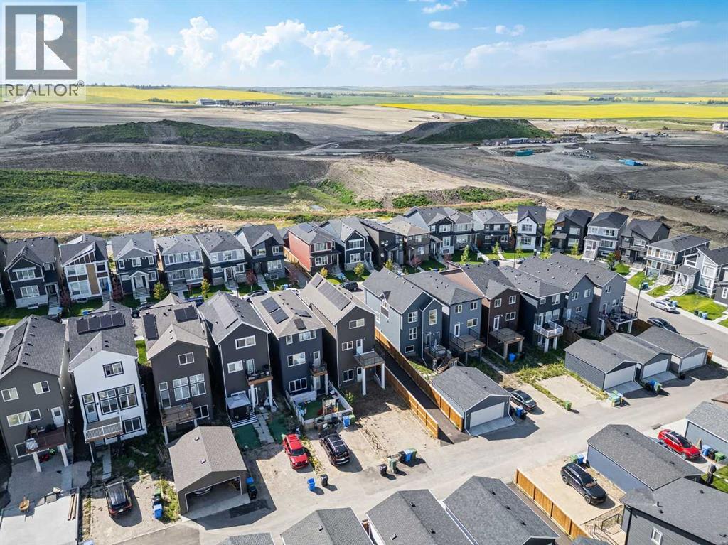 Single Family House 5 Level for Sale in  Aquila Way NW Glacier Ridge Calgary 