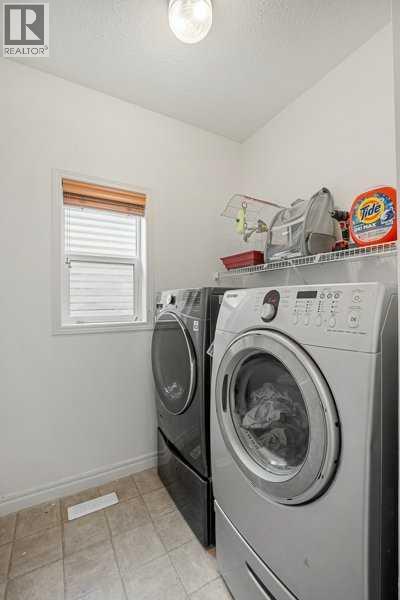 Single Family House for Sale in  Prestwick Terrace SE McKenzie Towne Calgary 