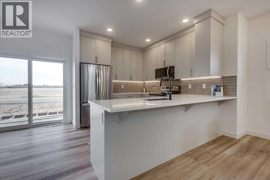 Single Family House Bi-level for Sale in  Emmett Crescent Evergreen Red Deer 