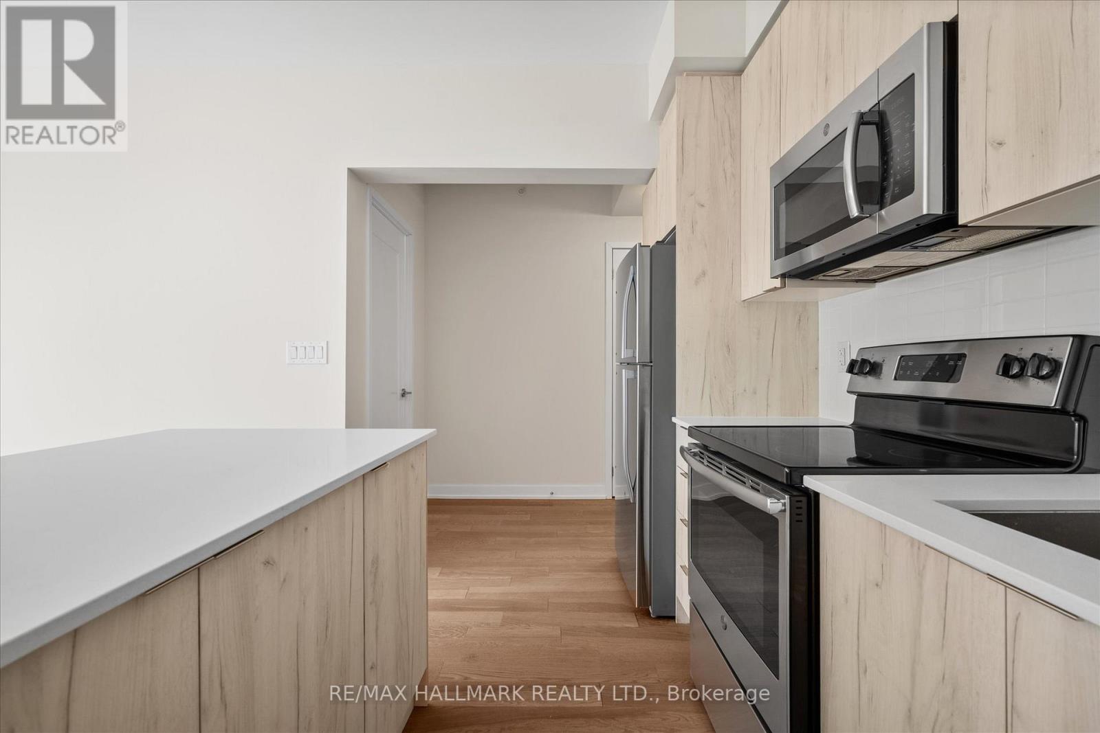 409 – 1350 KINGSTON ROAD,Toronto (Birchcliffe-Cliffside),,