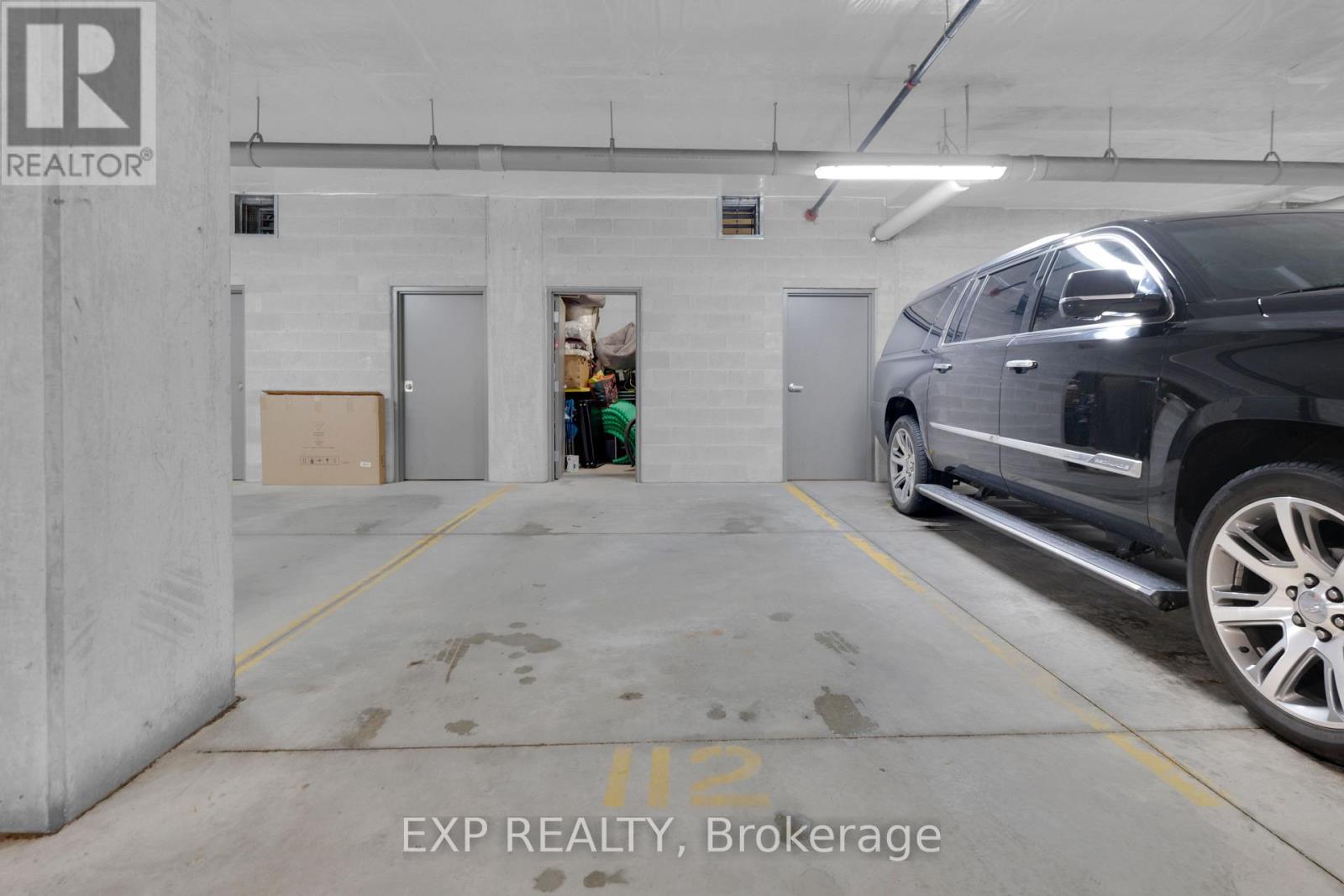 Parking space and storage locker