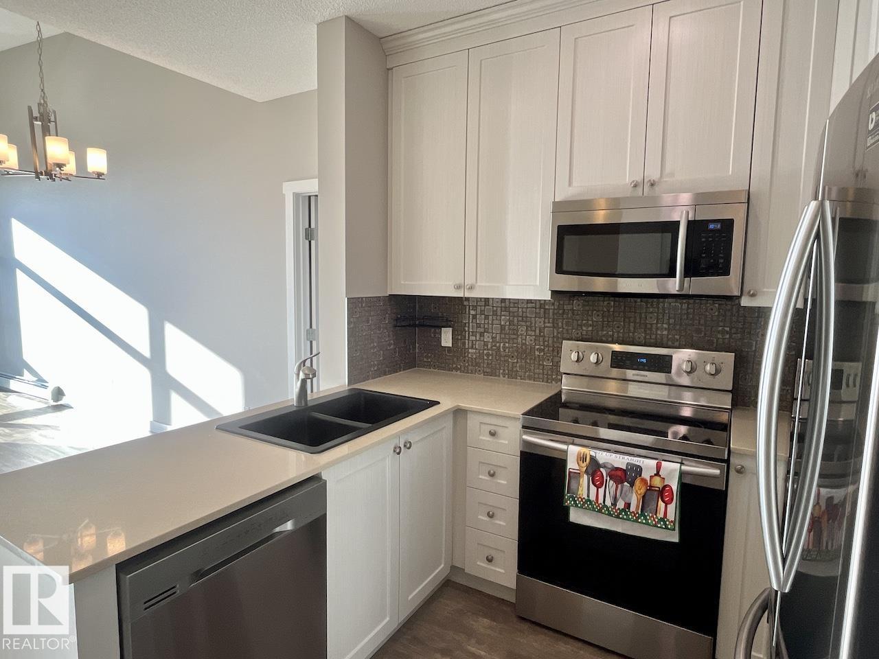 #407 12804 140 AV NW - 4