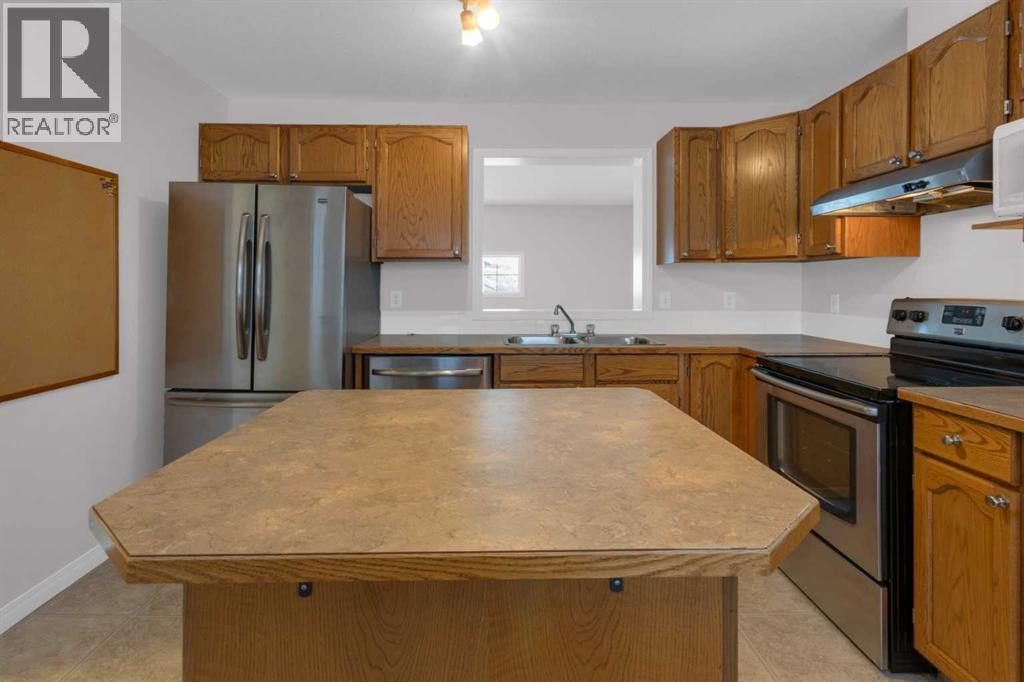 Single Family House 3 Level for Sale in  Hidden Creek Cove NW Hidden Valley Calgary 