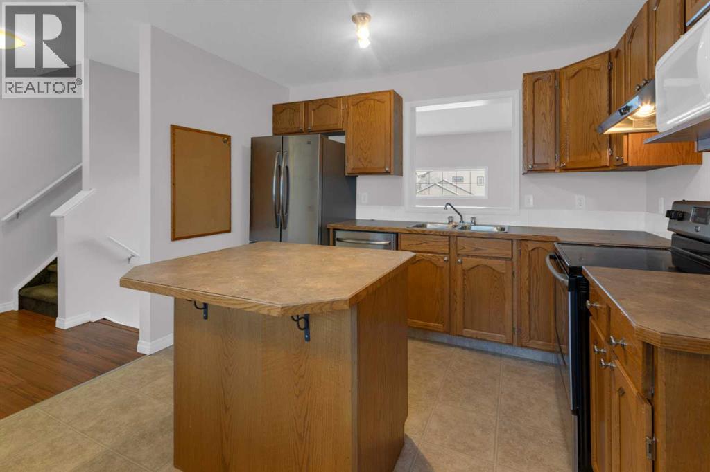 Single Family House 3 Level for Sale in  Hidden Creek Cove NW Hidden Valley Calgary 