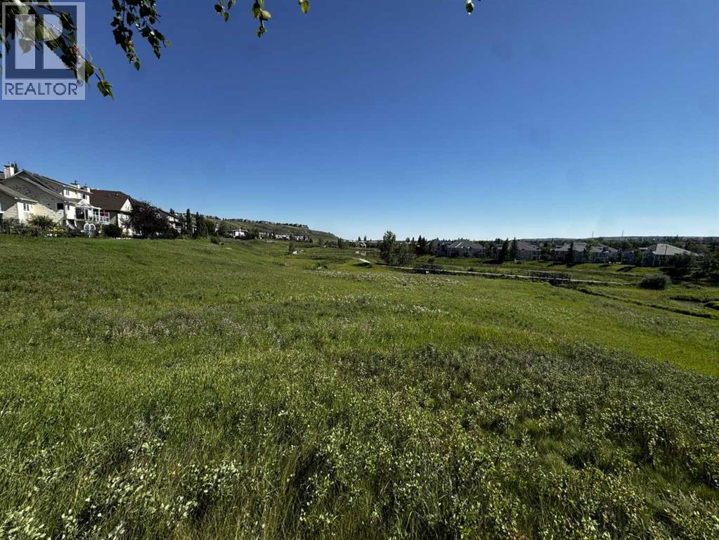 Single Family House 3 Level for Sale in  Hidden Creek Cove NW Hidden Valley Calgary 