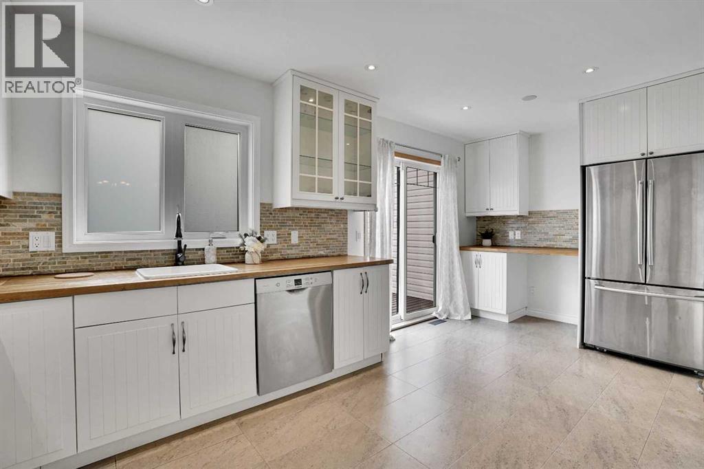 Single Family House 4 Level for Sale in  Millview Court SW Millrise Calgary 