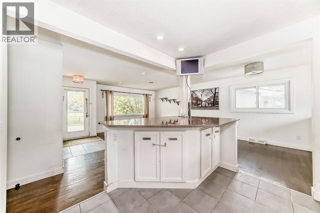 Single Family House Bungalow for Sale in  Bowlen Street NW Brentwood Calgary 