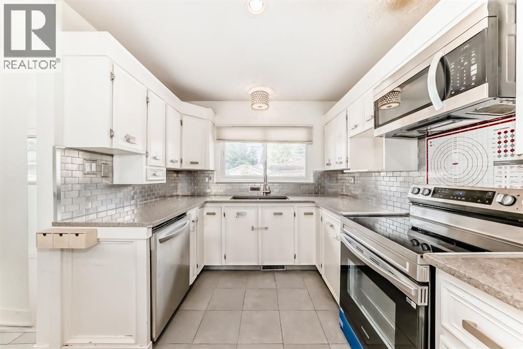 Single Family House Bungalow for Sale in  Bowlen Street NW Brentwood Calgary 