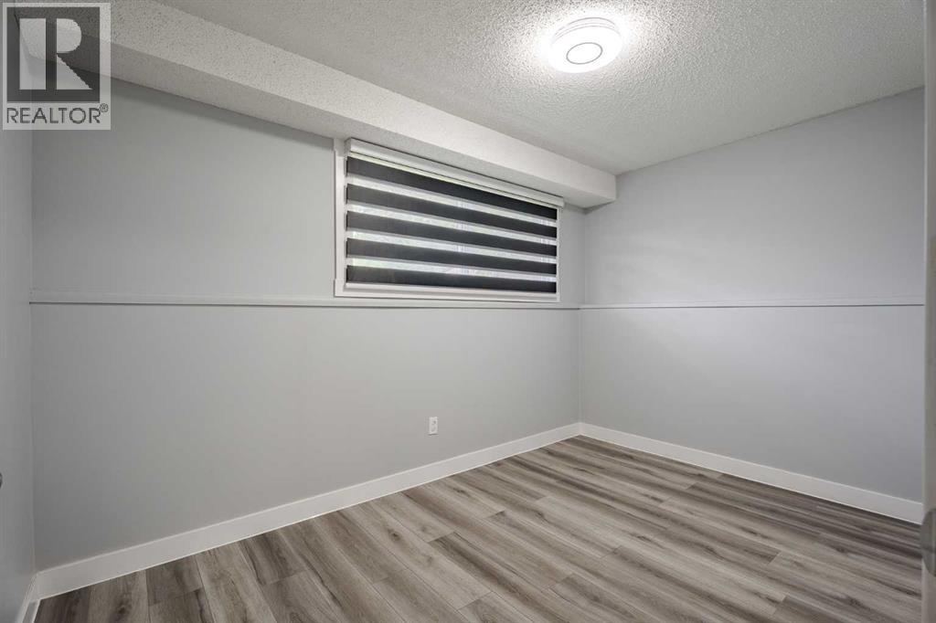 Multi-family House Bi-level for Sale in  Sabrina Road SW Southwood Calgary 