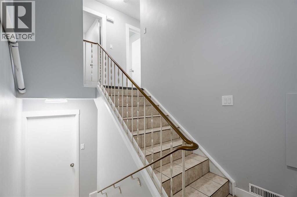 Multi-family House Bi-level for Sale in  Sabrina Road SW Southwood Calgary 