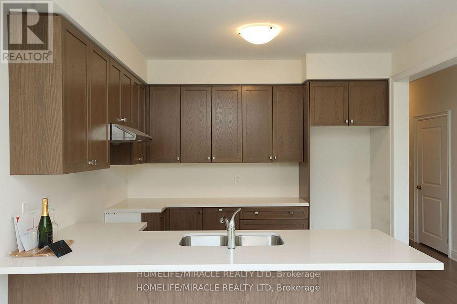 11 CALABRIA DRIVE - 13