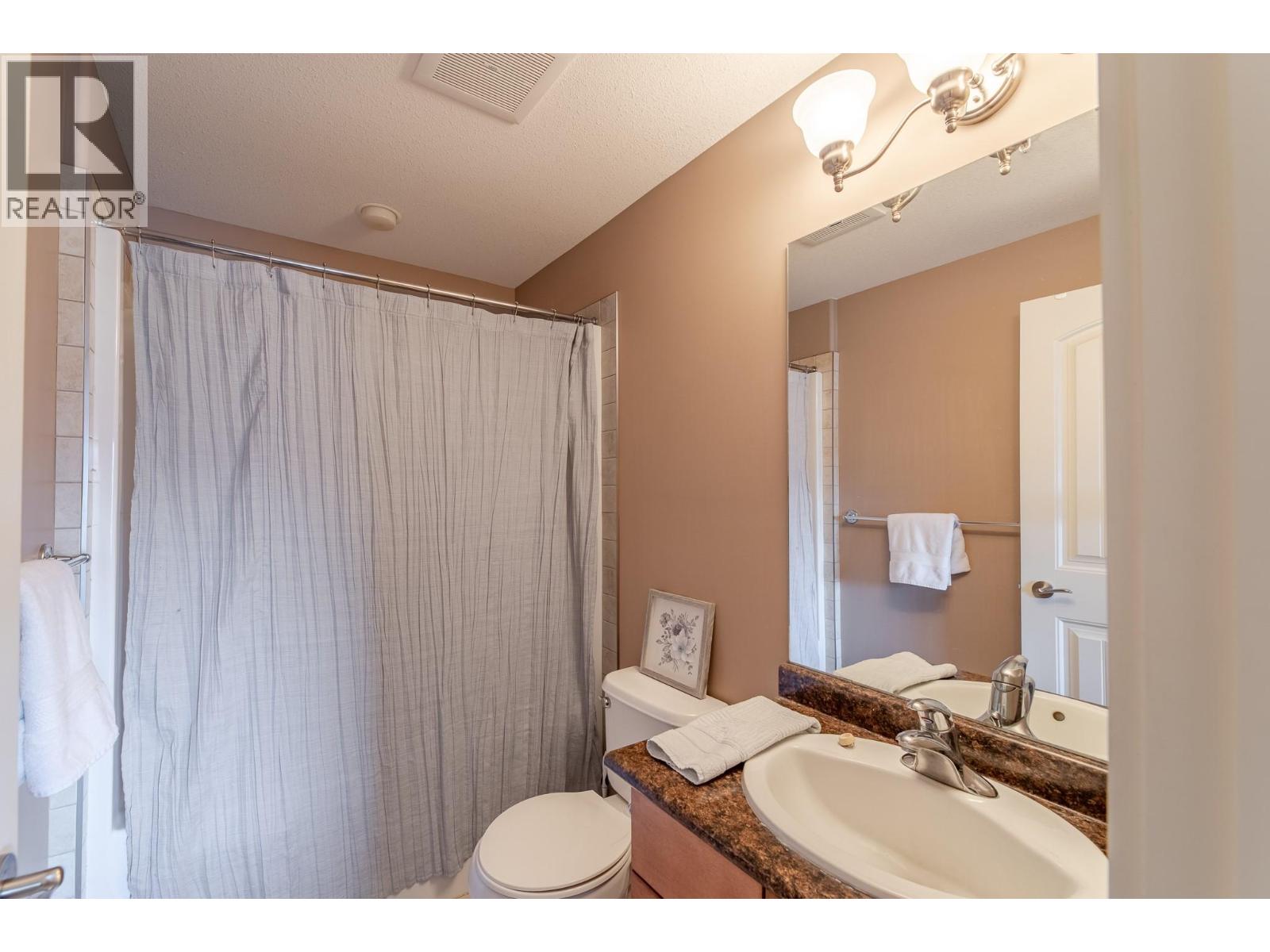 13615 VICTORIA Road Unit# 210, Summerland