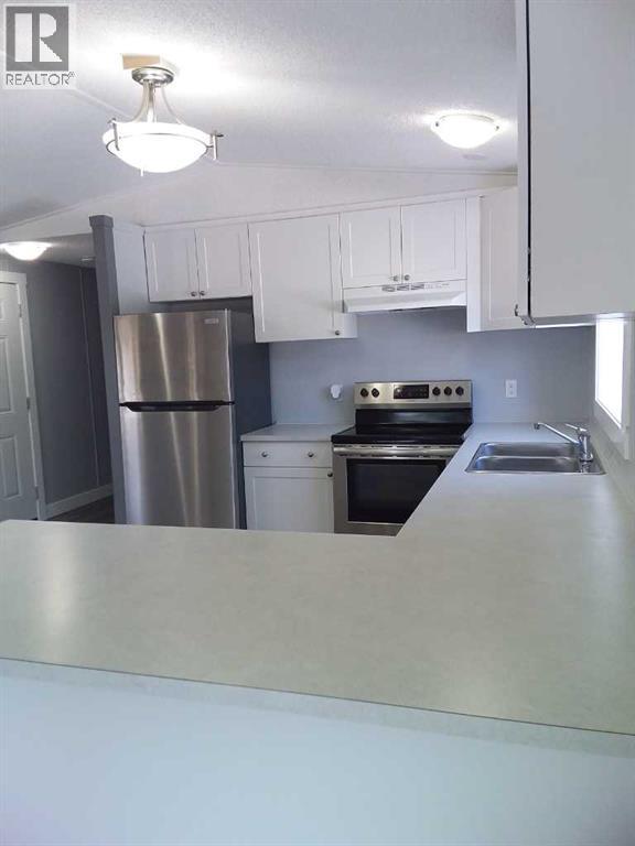 Single Family House Mobile Home for Sale in    Avenue SE Red Carpet Calgary 