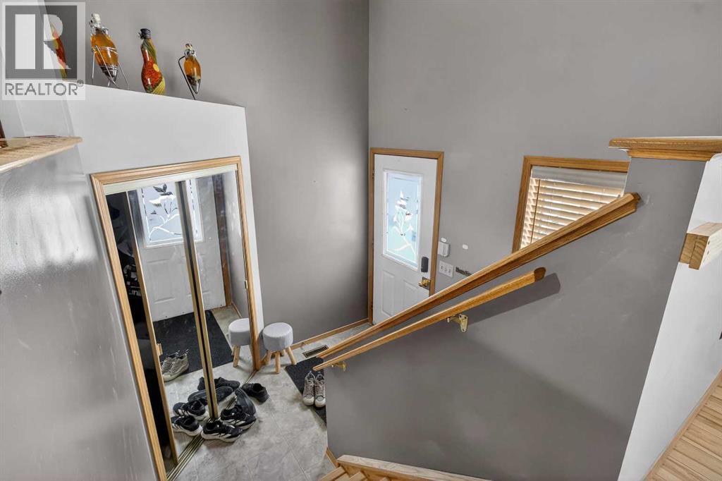 Single Family House Bi-level for Sale in  Erin Circle SE Erin Woods Calgary 