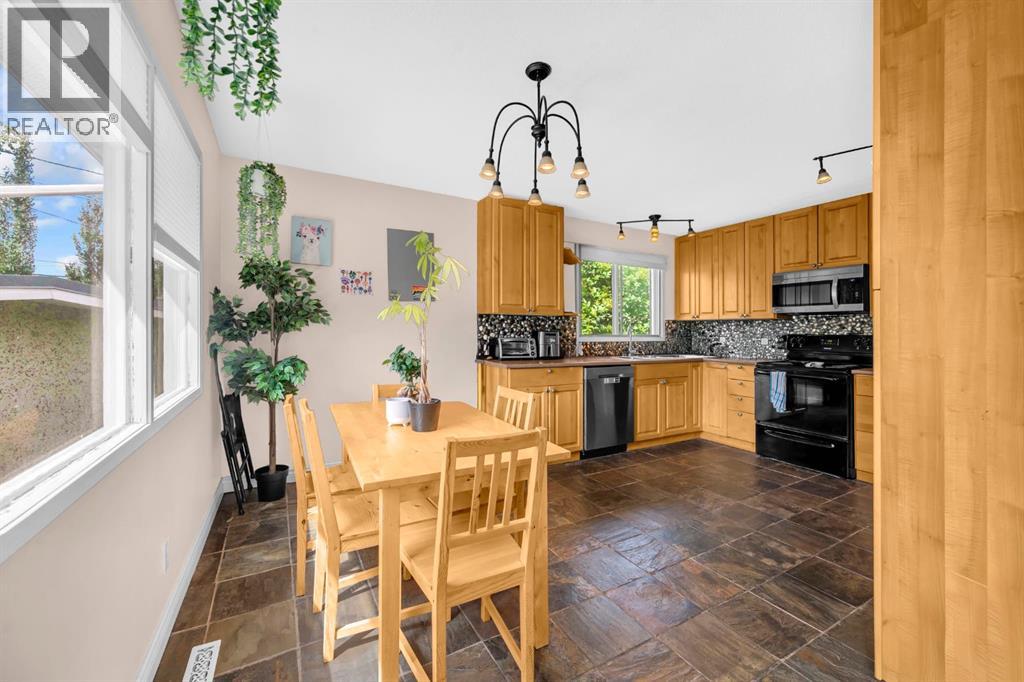 Multi-family House Bi-level for Sale in  Vance Place NW Varsity Calgary 