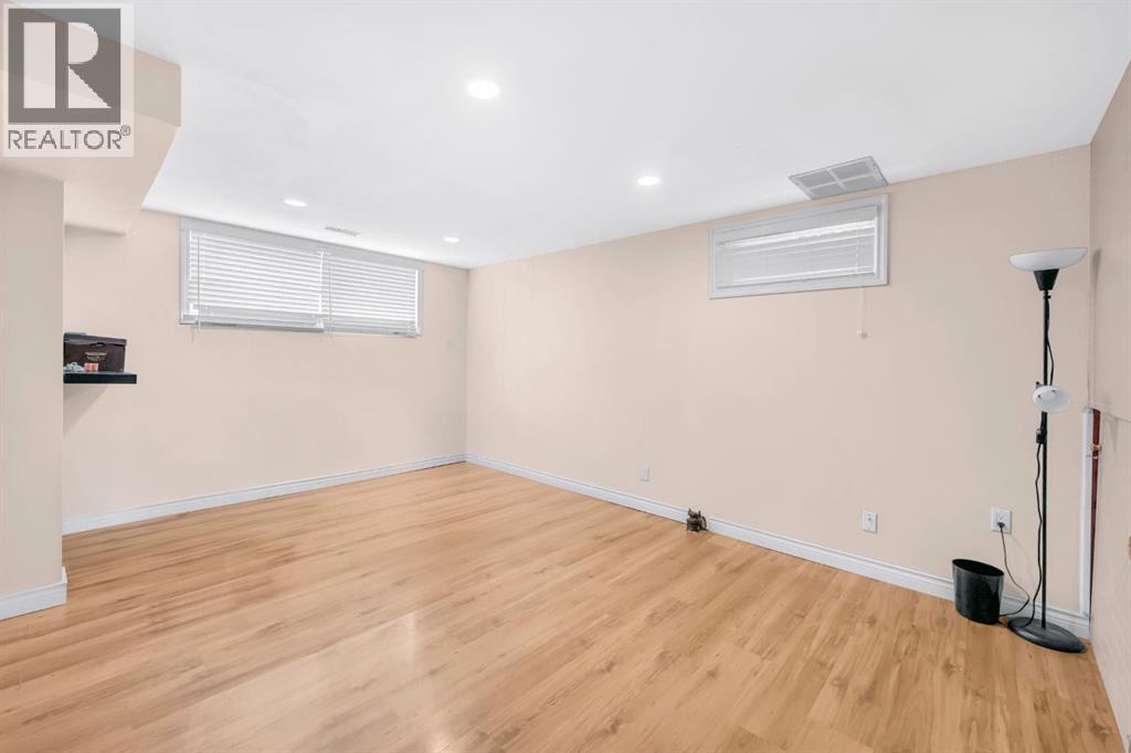 Multi-family House Bi-level for Sale in  Vance Place NW Varsity Calgary 