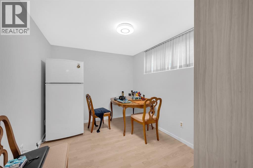 Multi-family House Bi-level for Sale in  Vance Place NW Varsity Calgary 