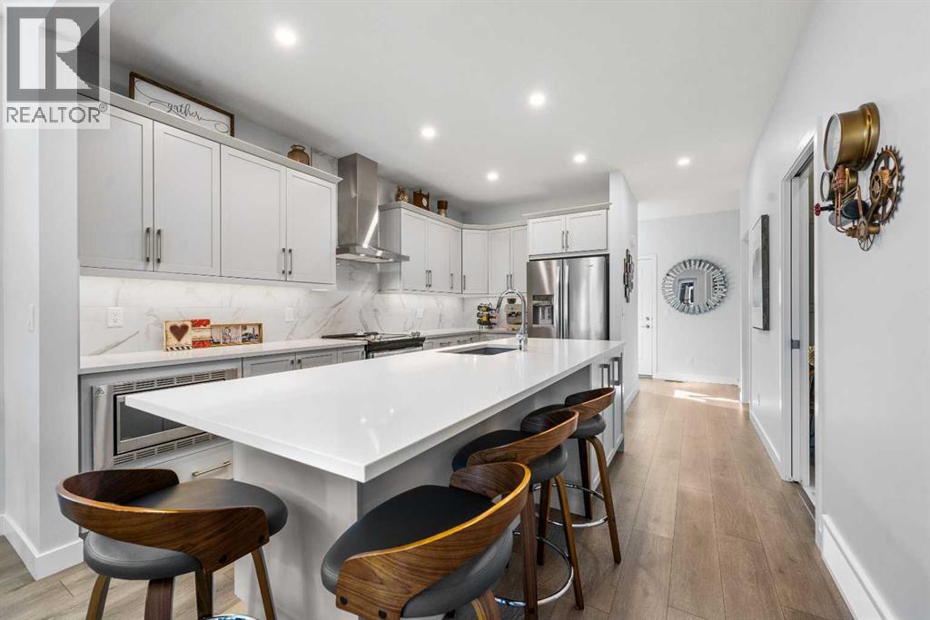 Single Family House Bungalow for Sale in  Marina Cove SE Mahogany Calgary 