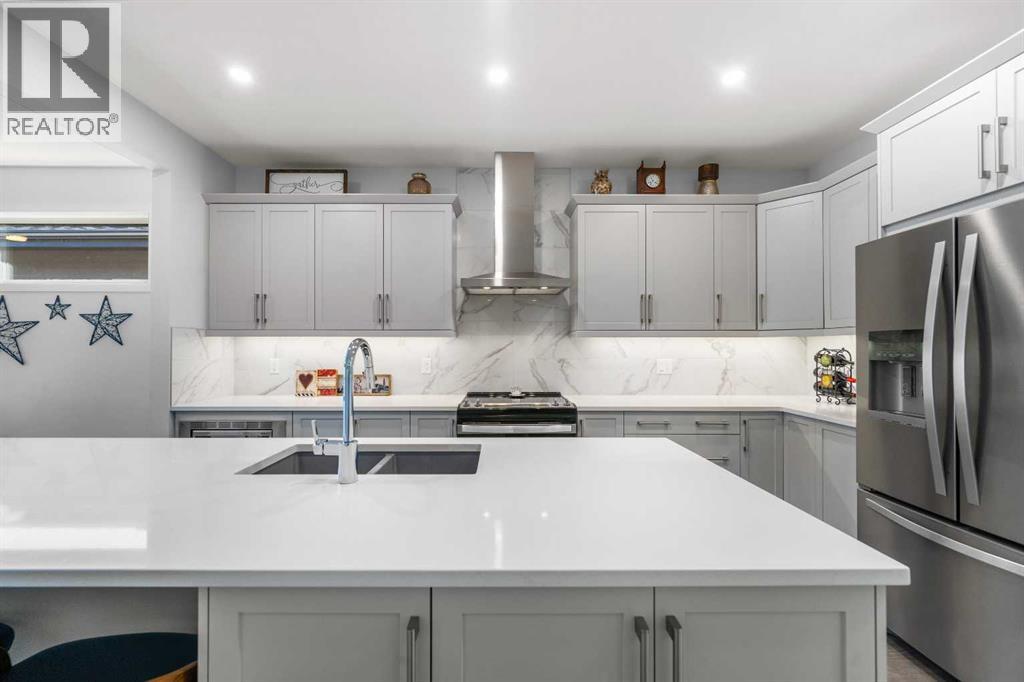 Single Family House Bungalow for Sale in  Marina Cove SE Mahogany Calgary 