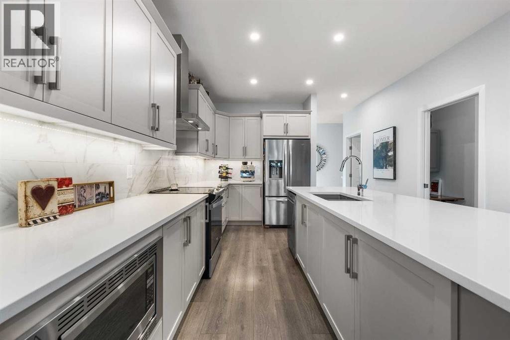 Single Family House Bungalow for Sale in  Marina Cove SE Mahogany Calgary 