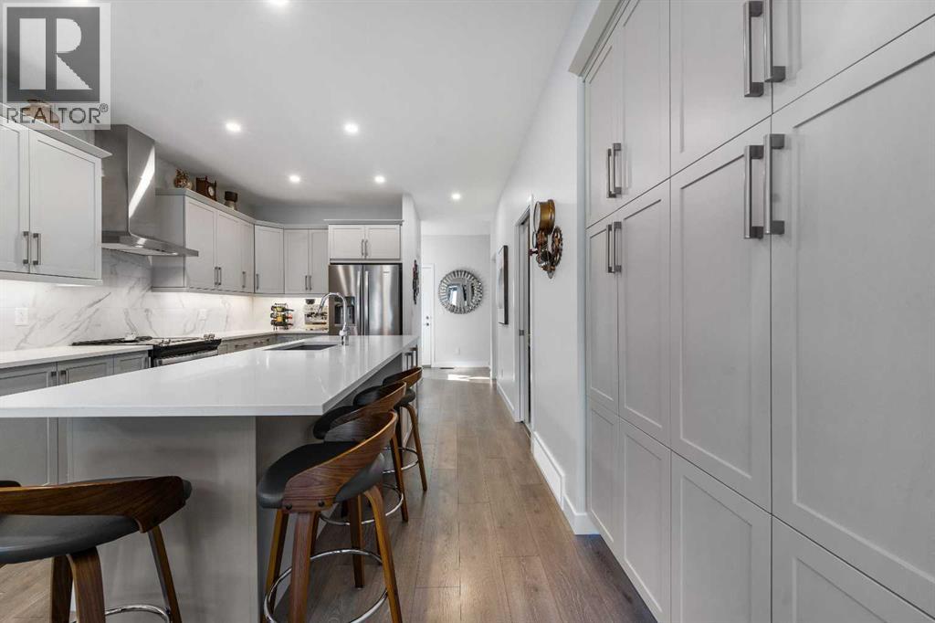 Single Family House Bungalow for Sale in  Marina Cove SE Mahogany Calgary 