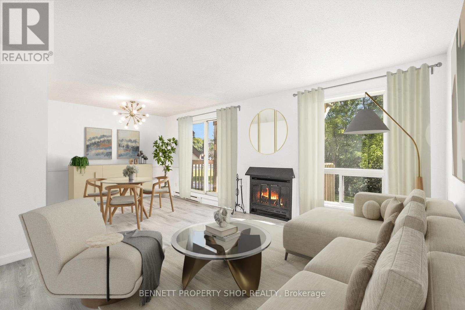 Deck off main level & cozy fire - virtually staged