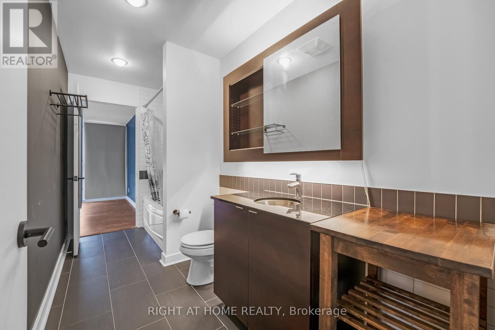 Accessed from hallway and Primary bedroom