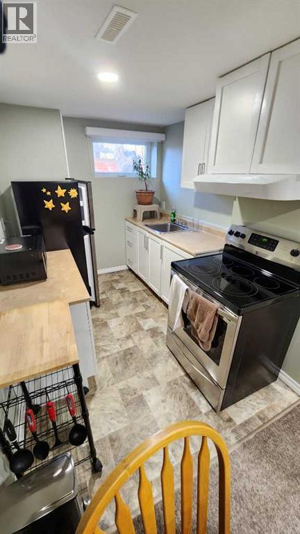 Single Family House Bungalow for Sale in   Avenue S Victoria Park Lethbridge 