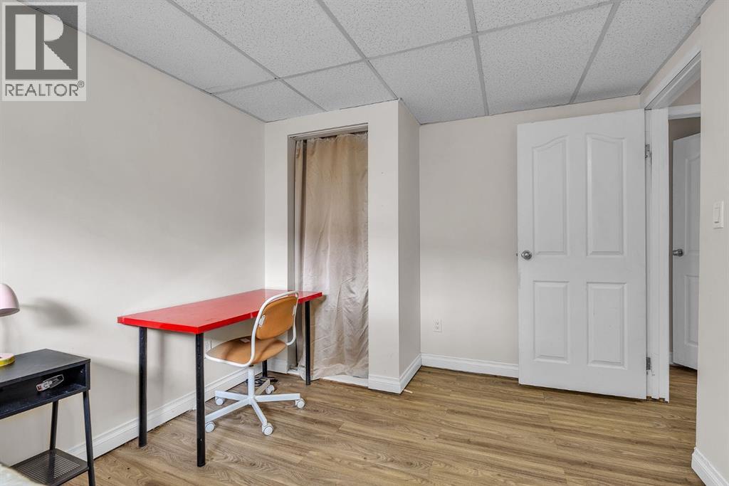 Single Family House Bi-level for Sale in  Athens Road SE Acadia Calgary 