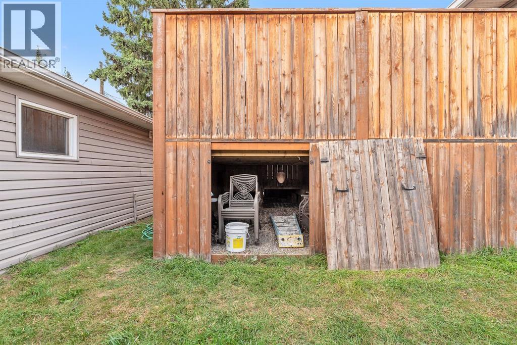 Single Family House Bi-level for Sale in  Athens Road SE Acadia Calgary 