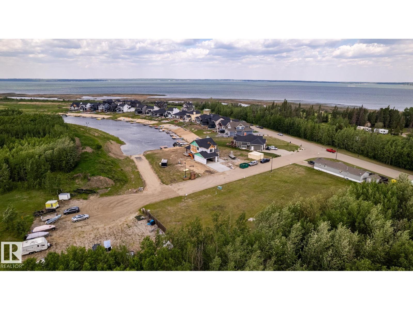 
          209 3410 STE. ANNE Trail
            <br/>
            <span>Rural Lac Ste. Anne County</span>
            , 
            <span>AB</span>
             <span>T0E0A1</span>
         - Photo 47