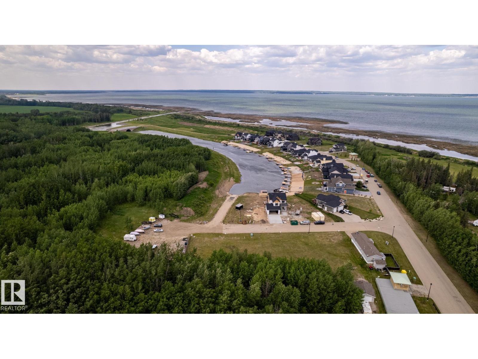 
          209 3410 STE. ANNE Trail
            <br/>
            <span>Rural Lac Ste. Anne County</span>
            , 
            <span>AB</span>
             <span>T0E0A1</span>
         - Photo 45