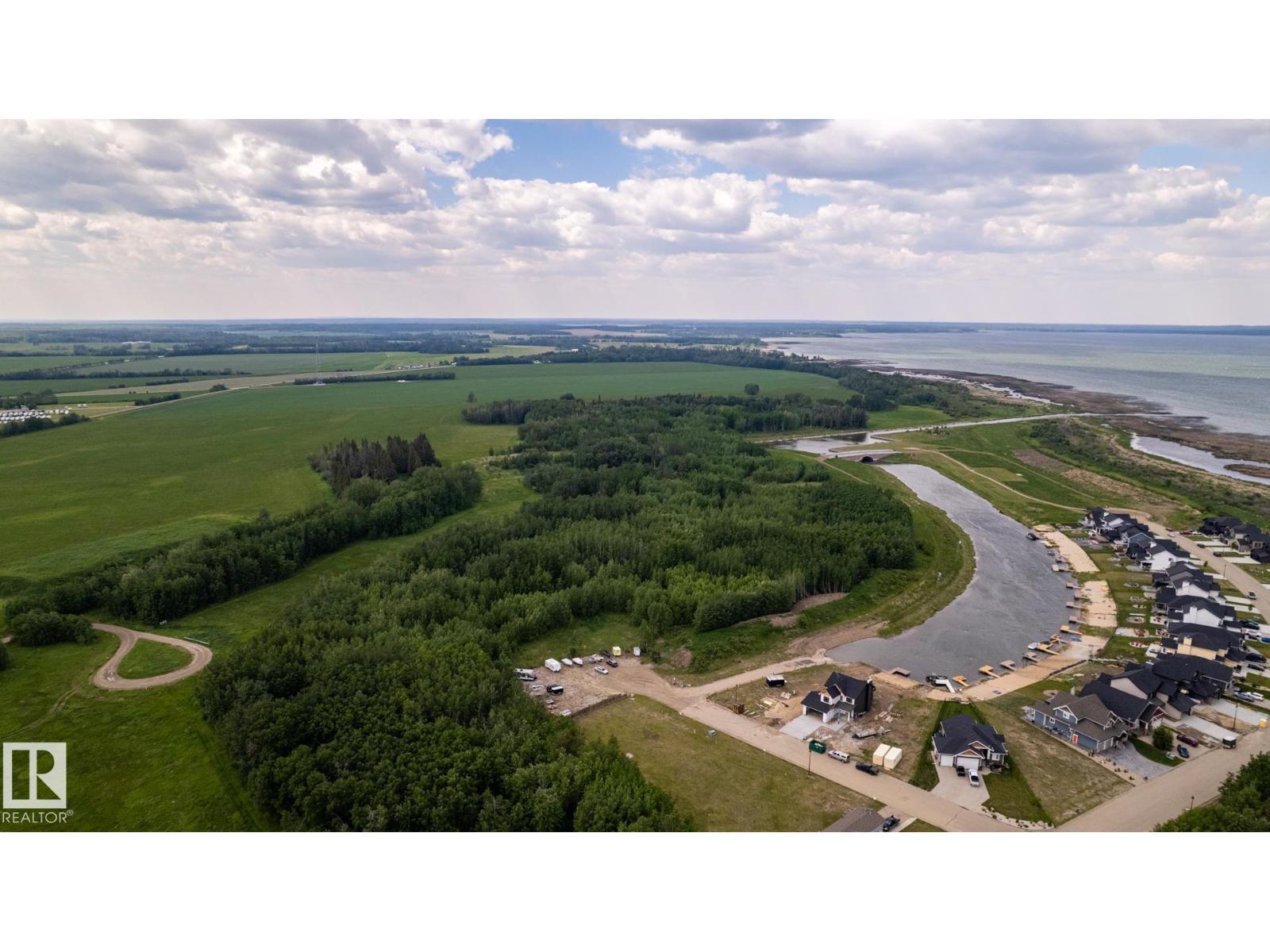 
          209 3410 STE. ANNE Trail
            <br/>
            <span>Rural Lac Ste. Anne County</span>
            , 
            <span>AB</span>
             <span>T0E0A1</span>
         - Photo 43