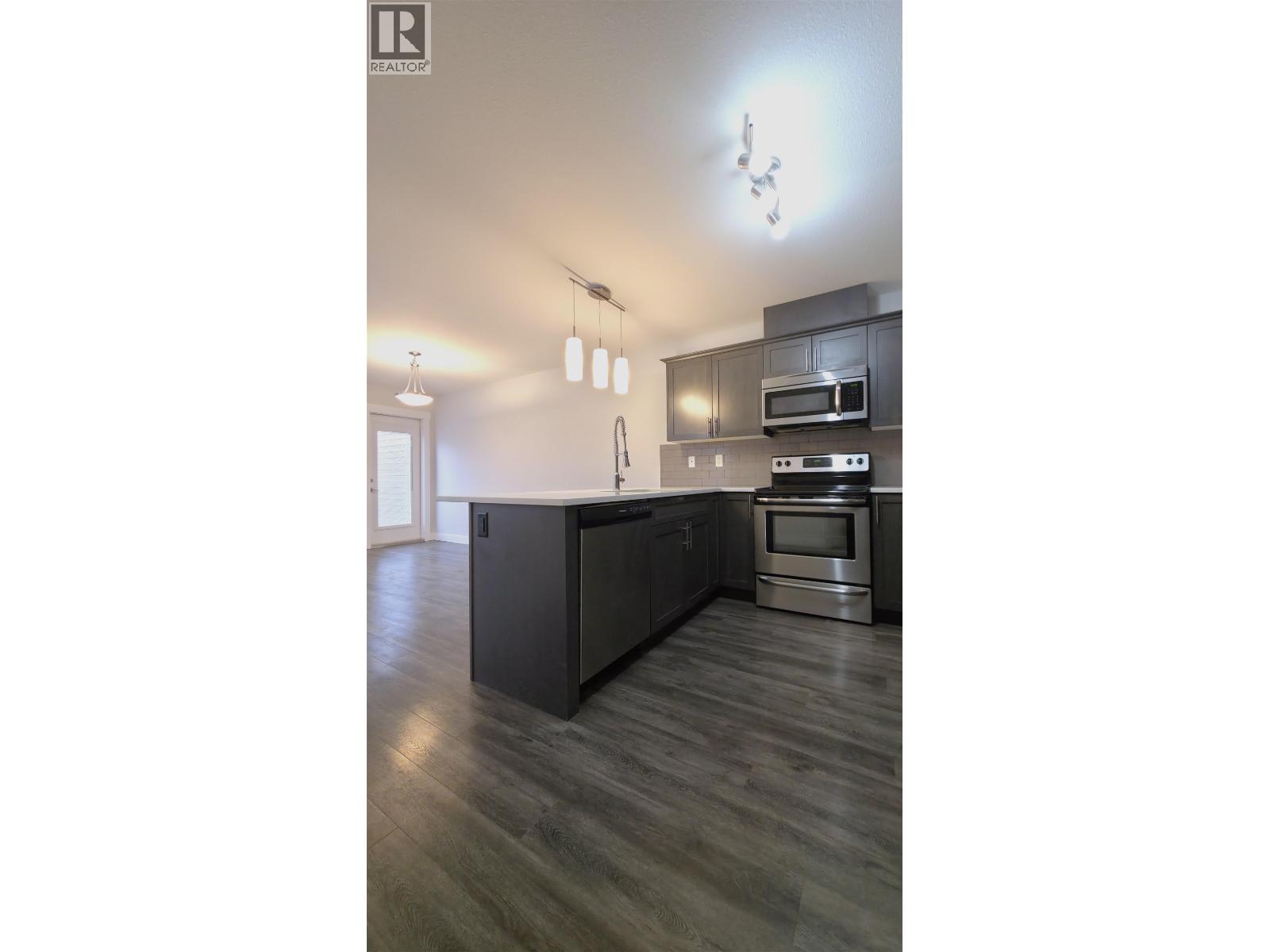 #101 6798 WESTGATE AVENUE - 3