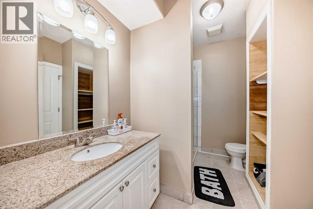 Single Family House Bungalow for Sale in  Simcoe Gate SW Signal Hill Calgary 