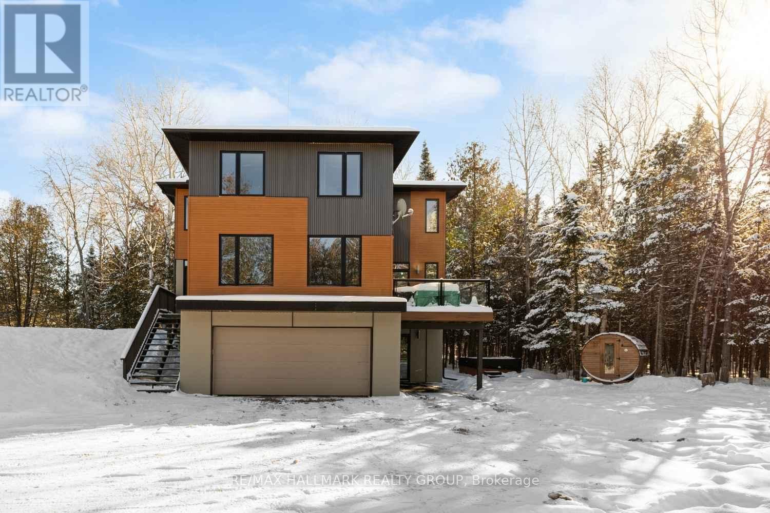 Modern custom home on private wooded lot