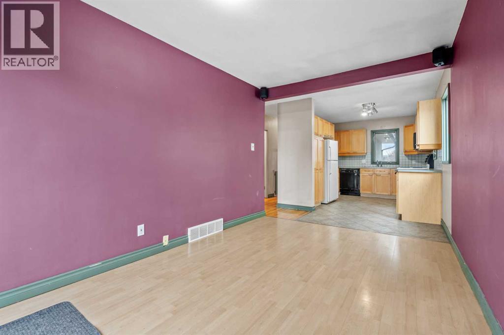 Multi-family House Bungalow for Sale in  &  A Street NW Hillhurst Calgary 