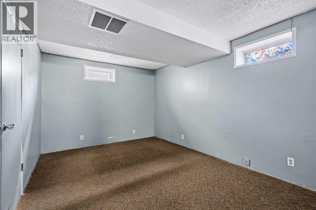 Multi-family House Bungalow for Sale in  &  A Street NW Hillhurst Calgary 