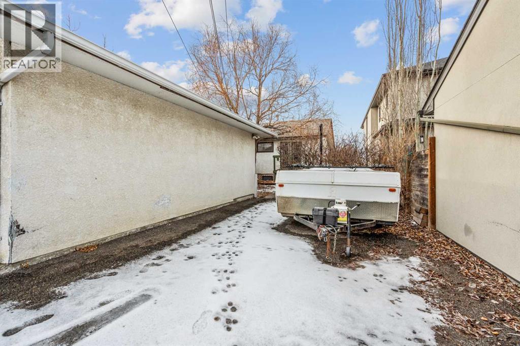 Multi-family House Bungalow for Sale in  &  A Street NW Hillhurst Calgary 