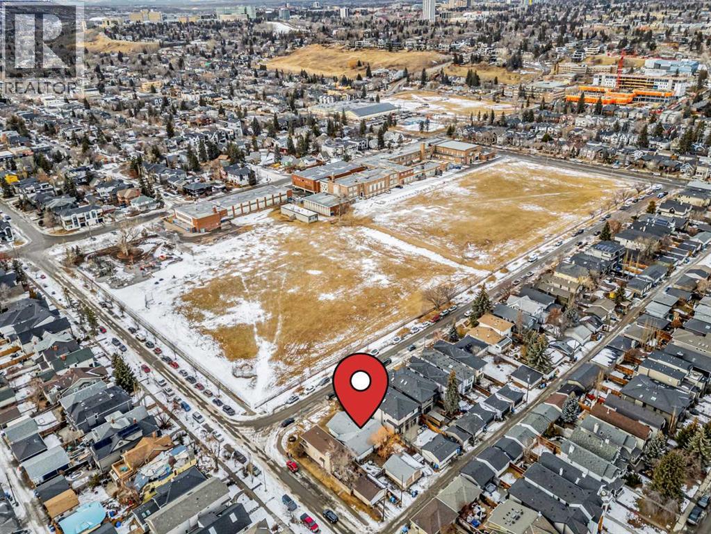 Multi-family House Bungalow for Sale in  &  A Street NW Hillhurst Calgary 