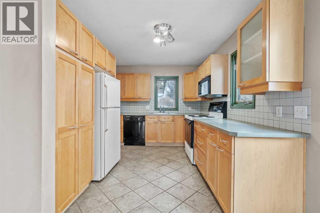 Multi-family House Bungalow for Sale in  &  A Street NW Hillhurst Calgary 