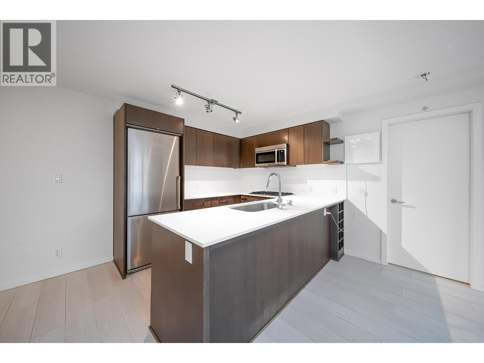 #701-7888 ACKROYD Road, Richmond