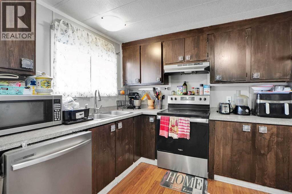 Single Family House Mobile Home for Sale in    Avenue SE Red Carpet Calgary 