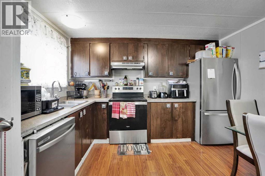 Single Family House Mobile Home for Sale in    Avenue SE Red Carpet Calgary 