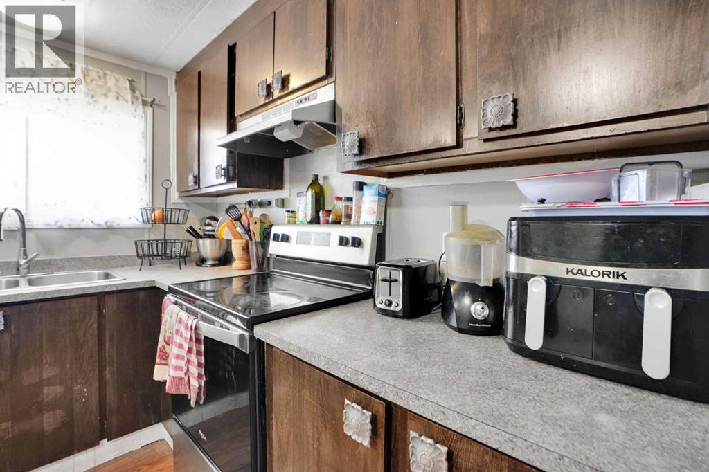 Single Family House Mobile Home for Sale in    Avenue SE Red Carpet Calgary 