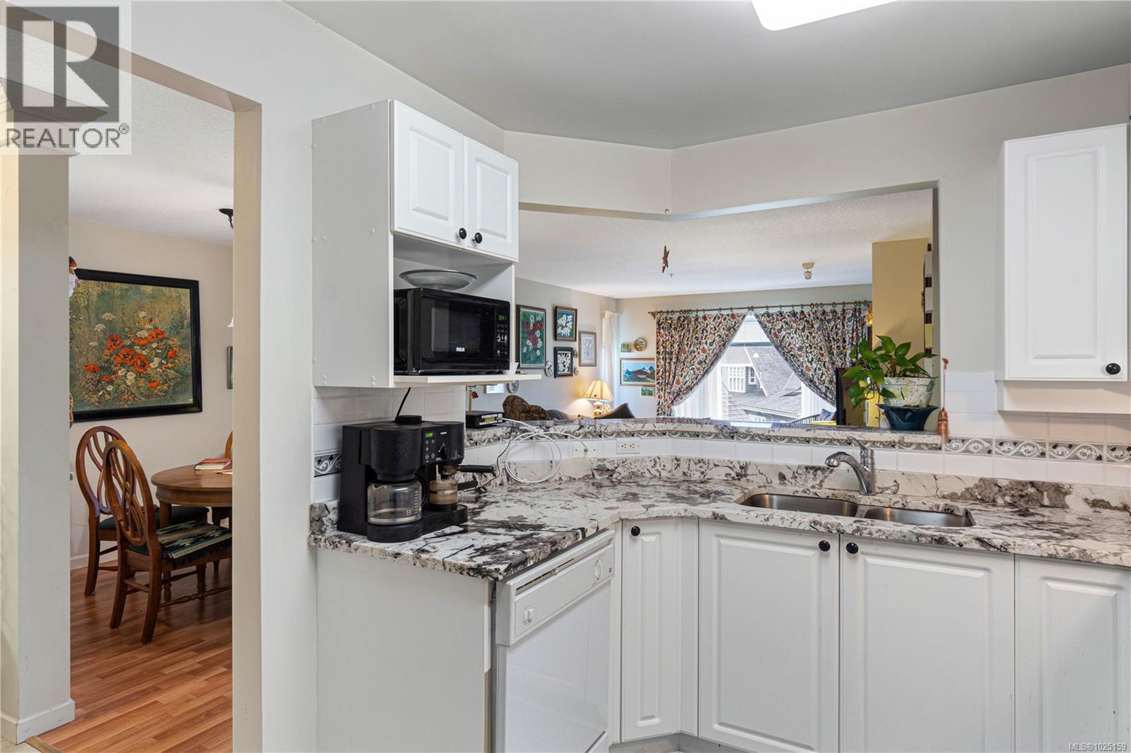 #201 5620 EDGEWATER LANE - 6