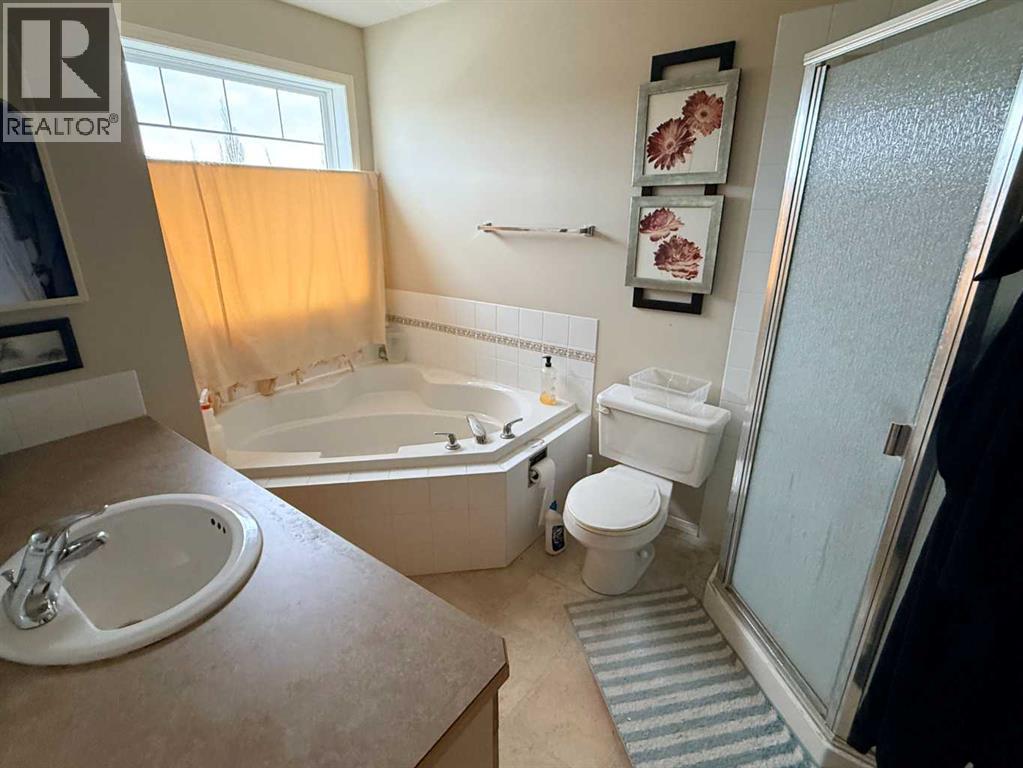 Single Family House for Sale in  Everwoods Close SW Evergreen Calgary 