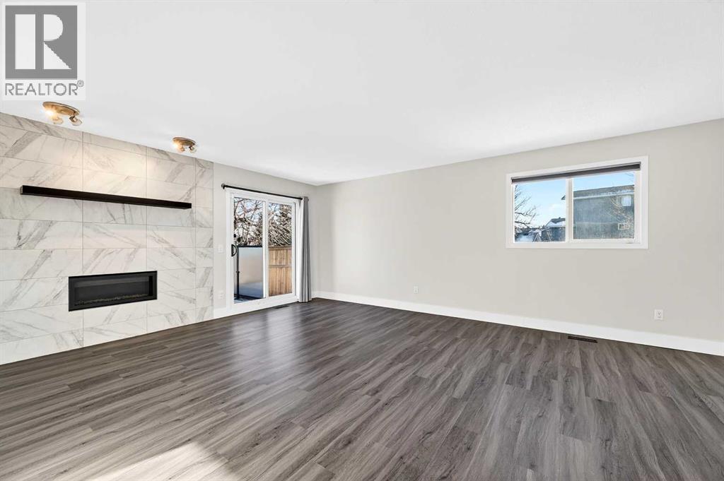 Single Family House 4 Level for Sale in  Sandarac Place NW Sandstone Valley Calgary 