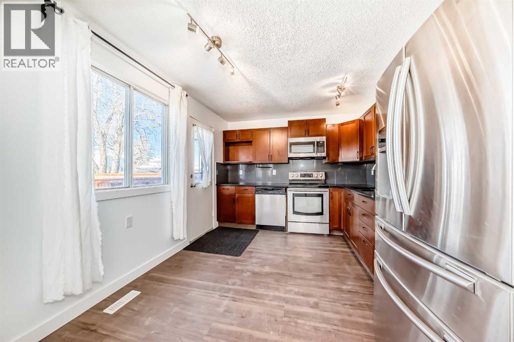 Single Family House for Sale in  Erin Mount Crescent SE Erin Woods Calgary 