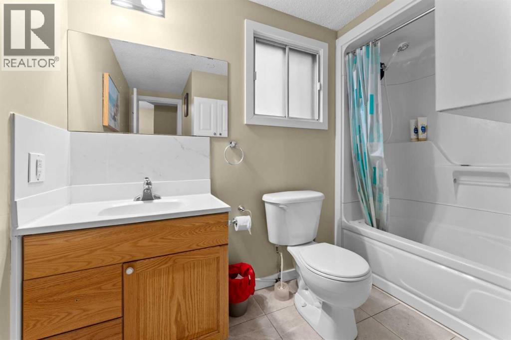 Multi-family House Bi-level for Sale in  &   Street NW Mount Pleasant Calgary 